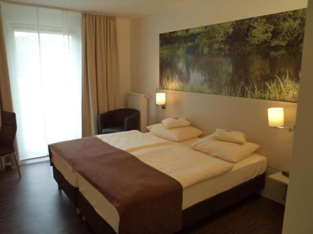 Das Neue Hotel Am Park Fröndenberg Quarto foto